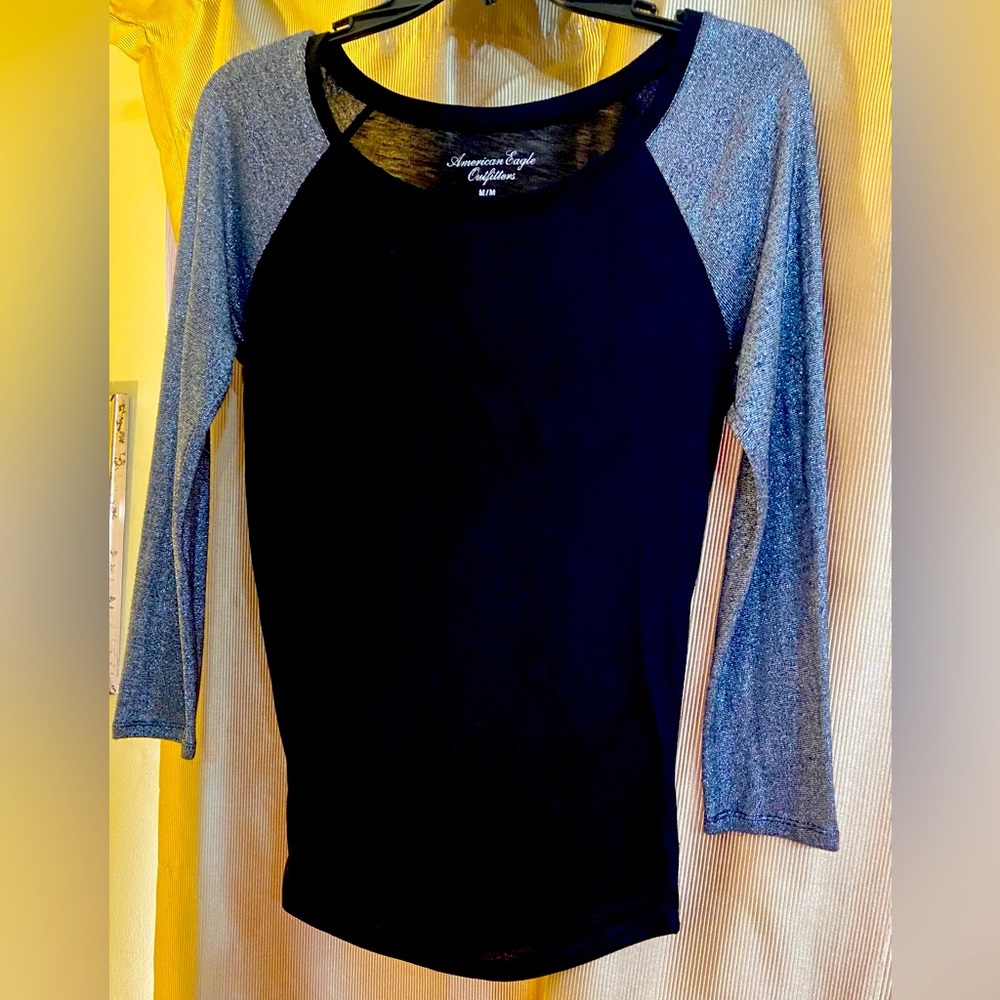 Size Medium Polyester. Nylon. Metallic Sleeves